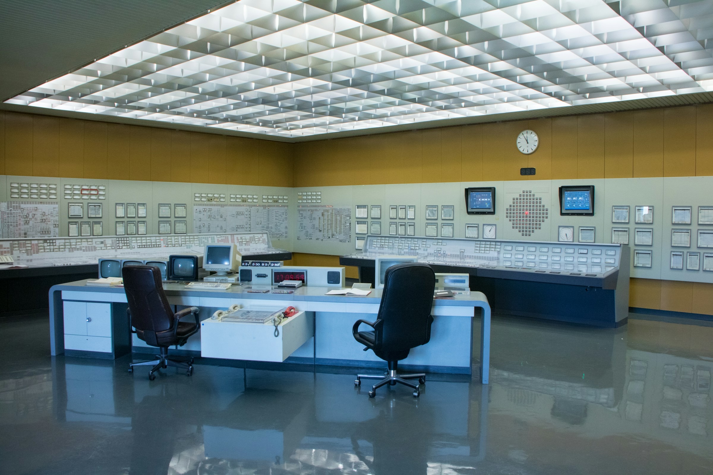 Industrial control room representing observable technical systems